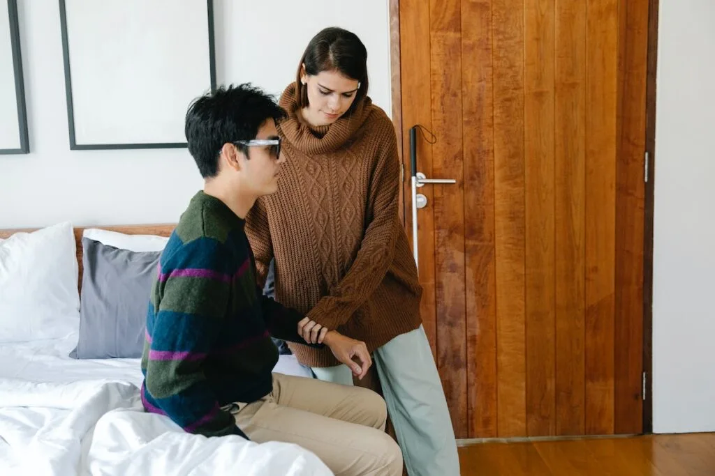 ndis support worker assisting a man