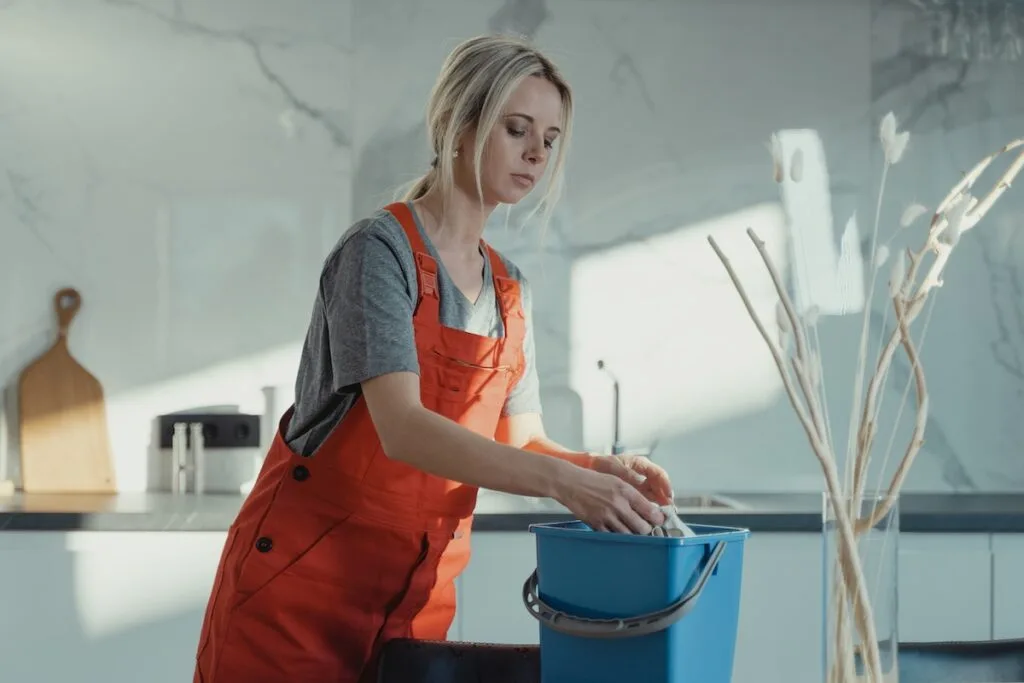 woman-cleaning-an-NDIS-participant-home
